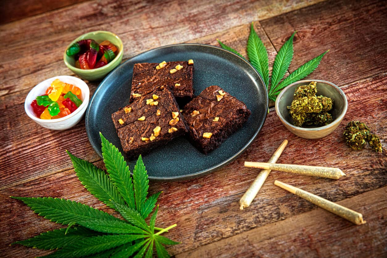 Table with different cannabis edibles