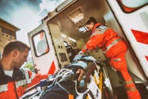man on a stretcher due to a motorcycle accident