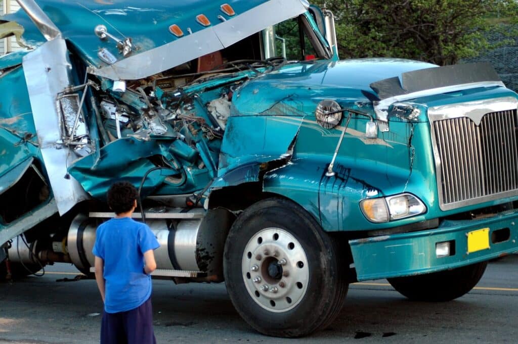 A crushed cab of a semi-truck after a semi-truck accident.
