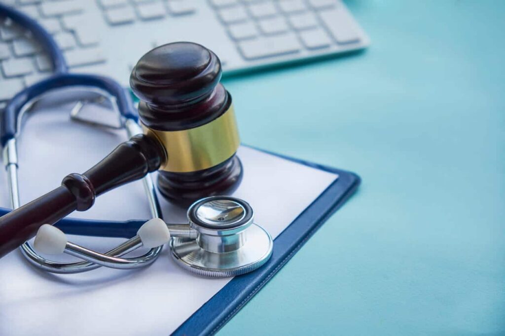 A stethoscope and a gavel representing a medical lawsuit