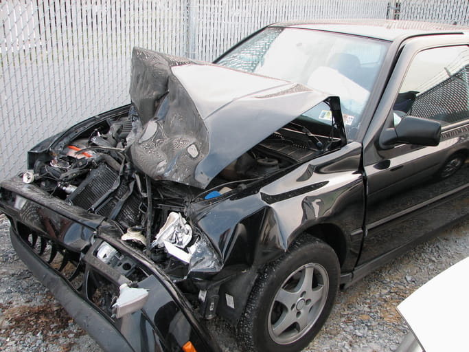 St. Petersburg Car Accident Lawyer 1 Black Car Front End Damage