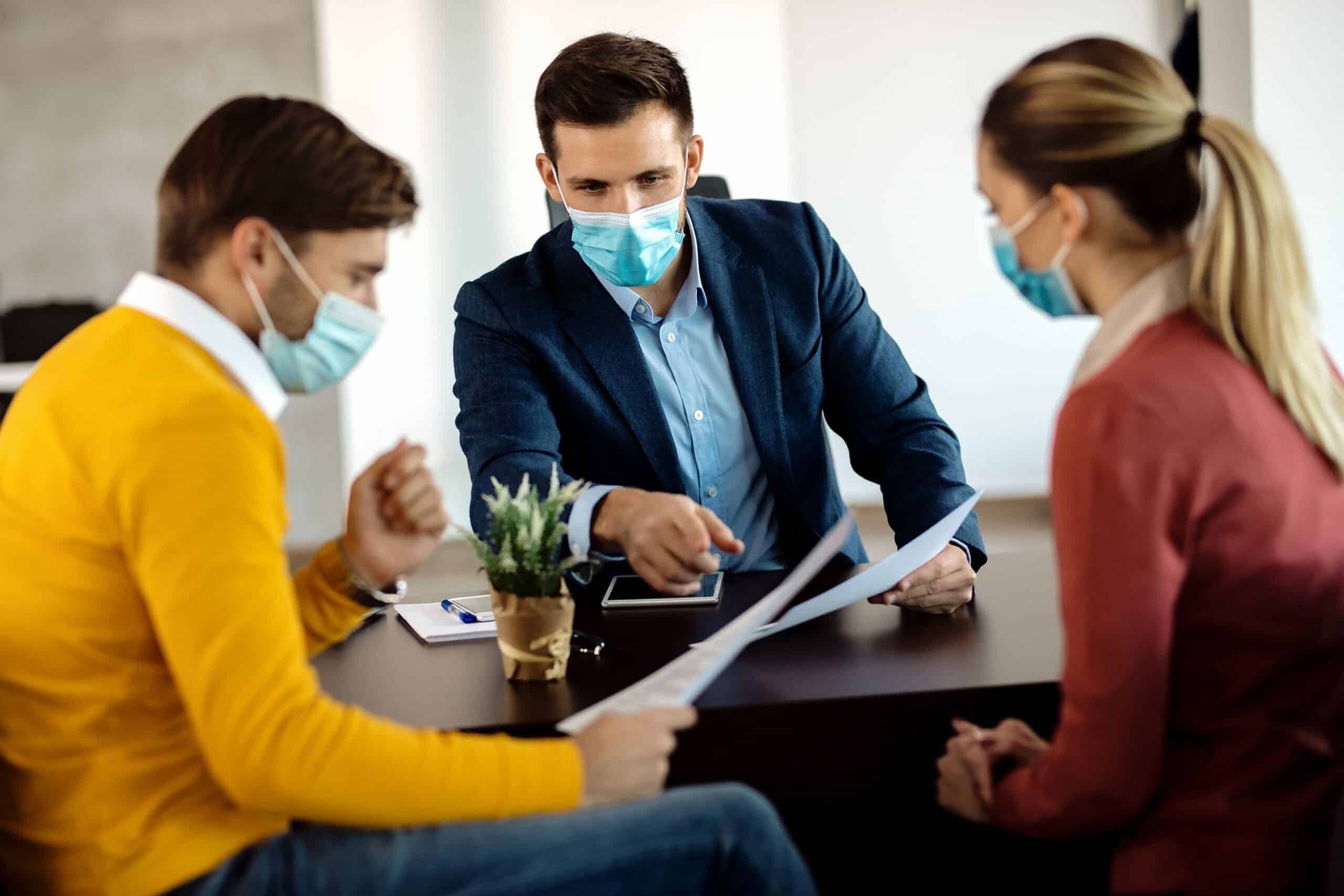 Ybor City (33605) Personal Injury Lawyer Tampa 1 Personal Injury Lawyer Reviewing Accident Claim Documents With Clients During A Legal Consultation In Ybor City Tampa Fl 33605.